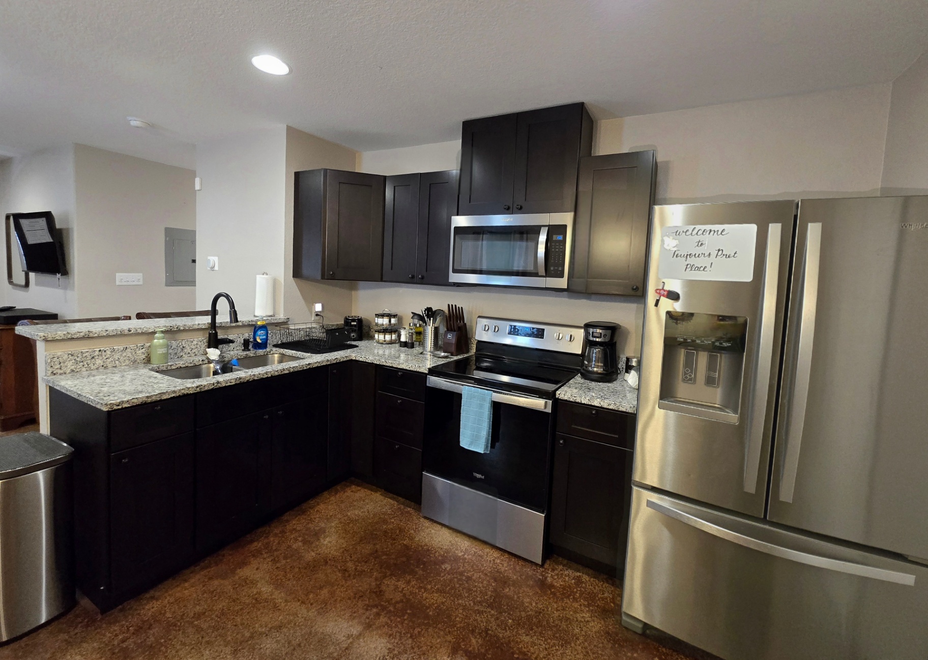 Unit B fully equipped kitchen with appliances