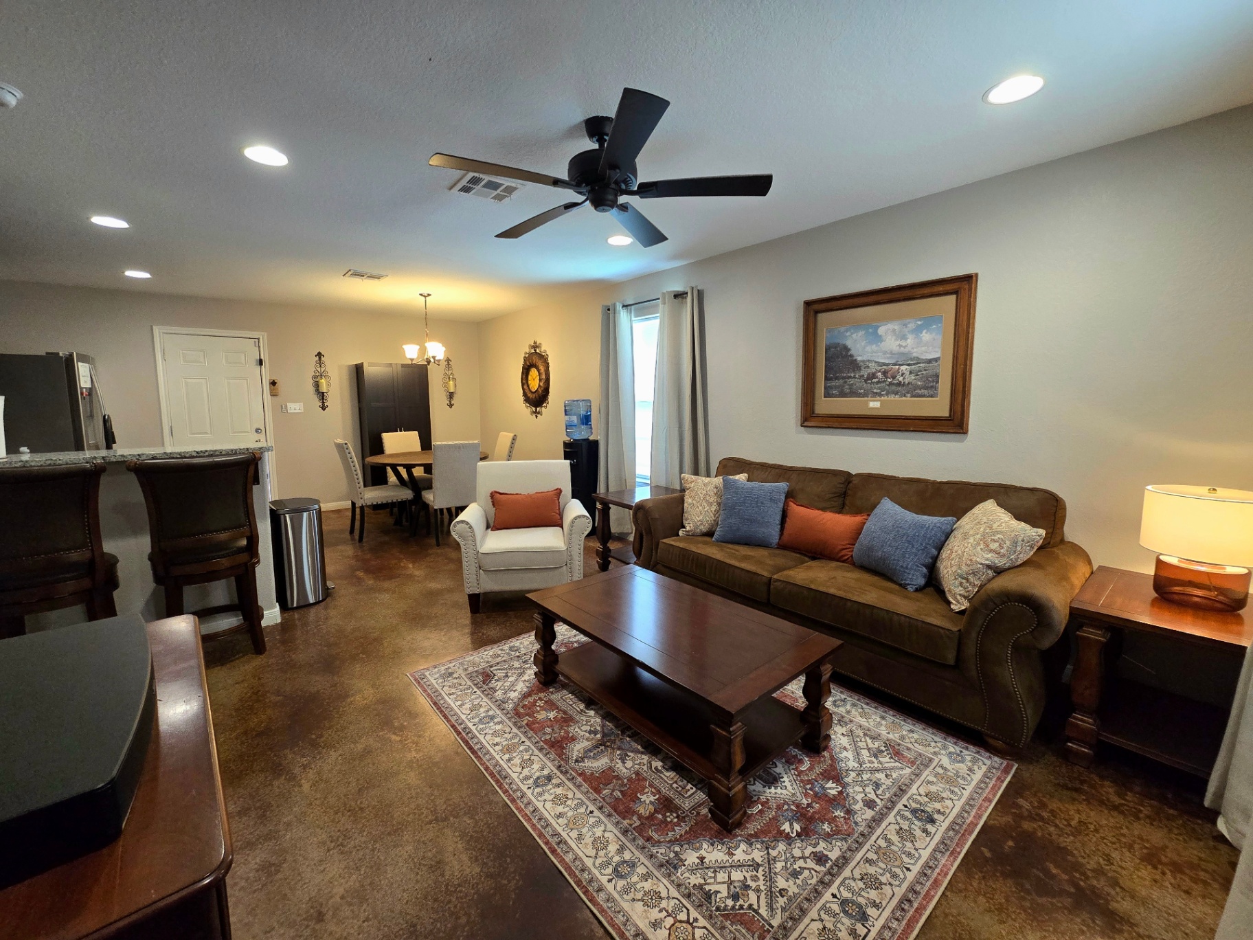 Unit B spacious living room with sofa
