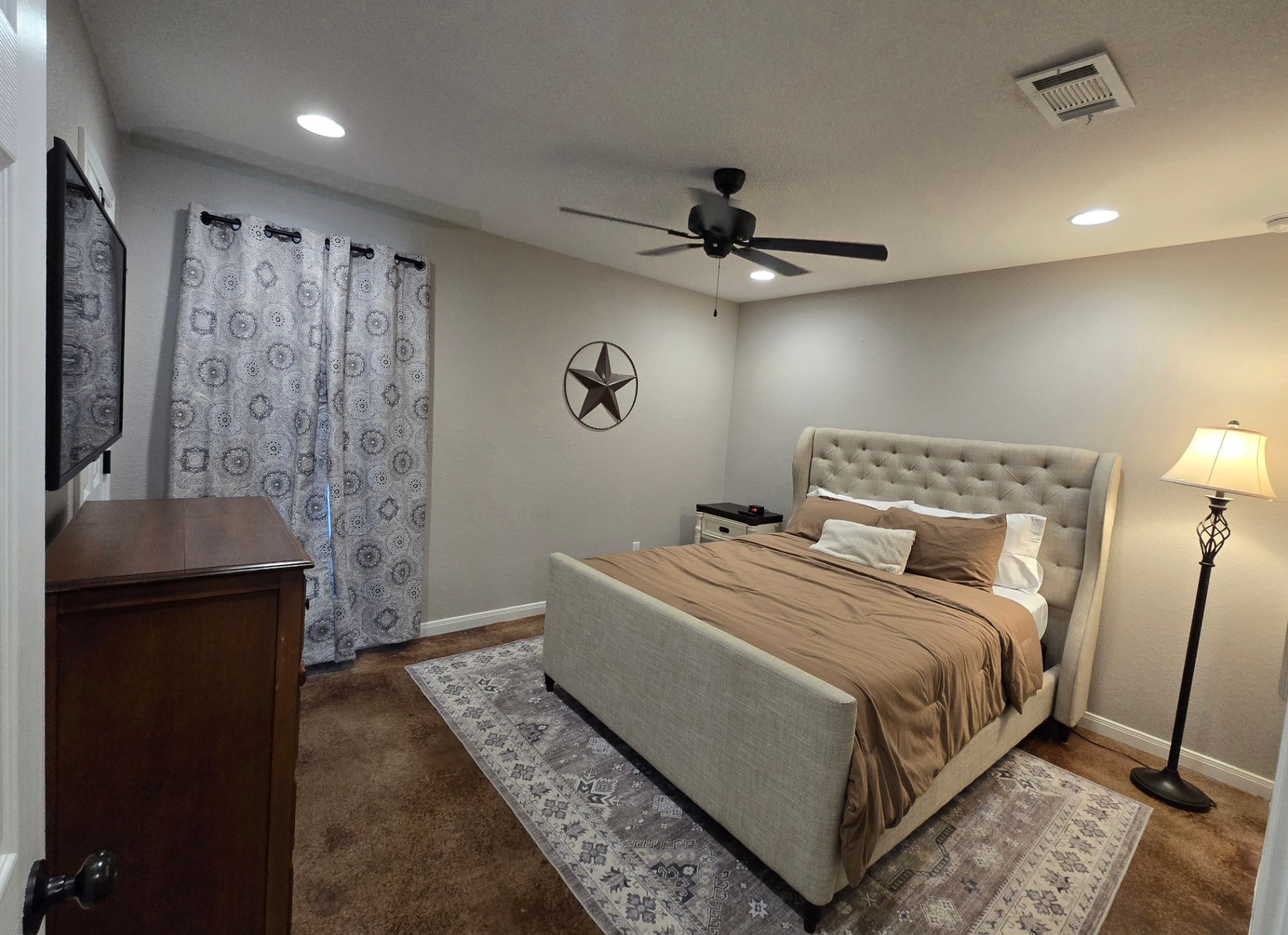 Unit B first bedroom with comfortable bed